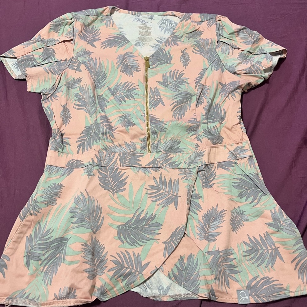 Jaanuu peplum scrub top
